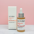 LUVIMA POREfection Serum bottle and packaging on a pink background