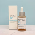 LUVIMA TIMEliss Serum bottle and packaging on a light blue background