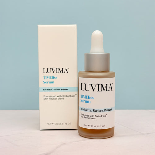 LUVIMA TIMEliss Serum bottle and packaging on a light blue background